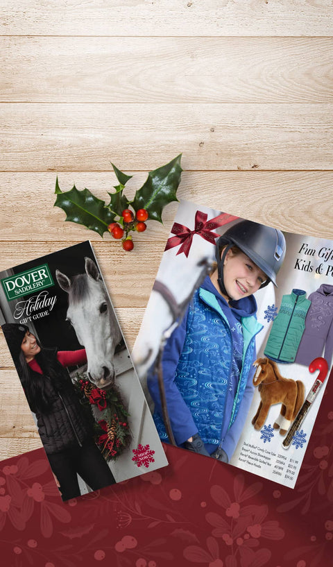 Dover Saddlery Gift Guide with wooden background with holly berries
